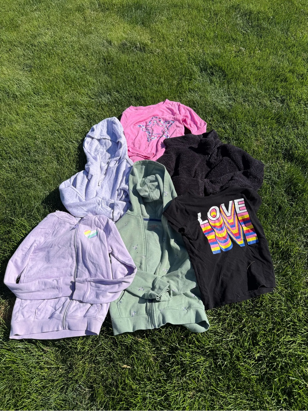 4 hoodies, 1 short sleeve, 1 long sleeve 7/8 girls
